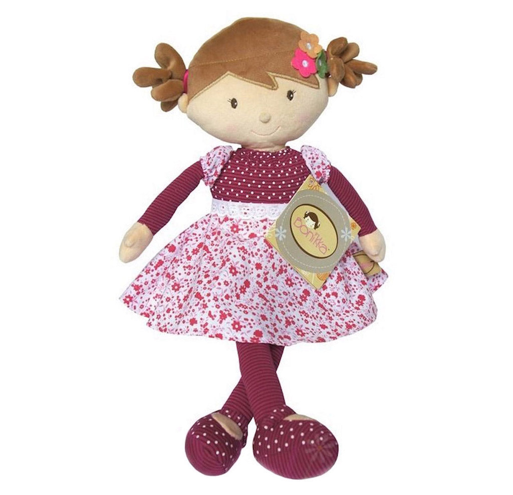 A personalised Bonikka Scarlett Rag Doll with pretty flowery embroidered dress and flowers in her hair