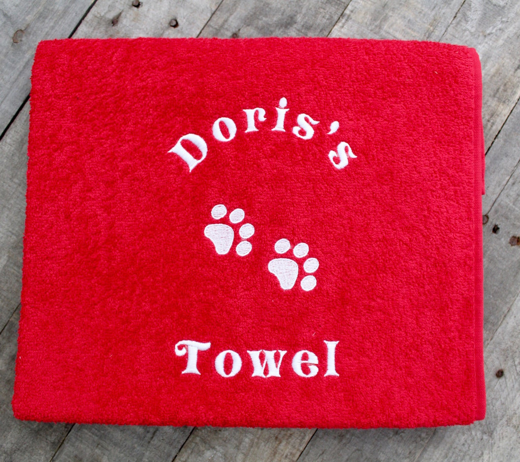 A large red Personalised pet Cat bath Towel with name and pet paws