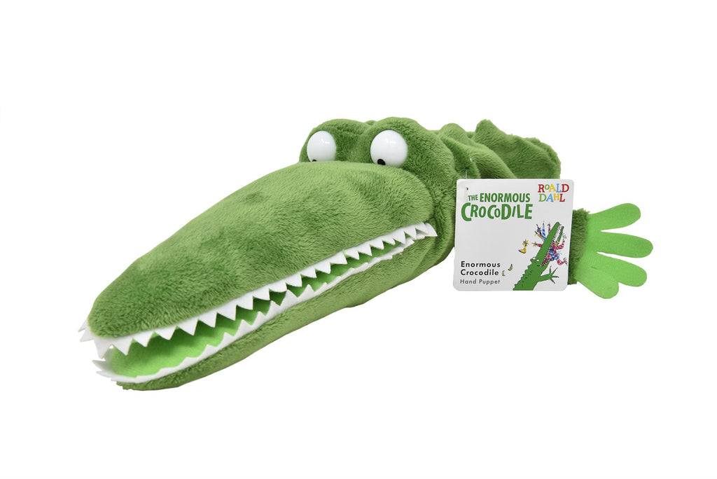 The enormous green crocodile hand puppet with bulging eyes and a big mouth full of white teeth
