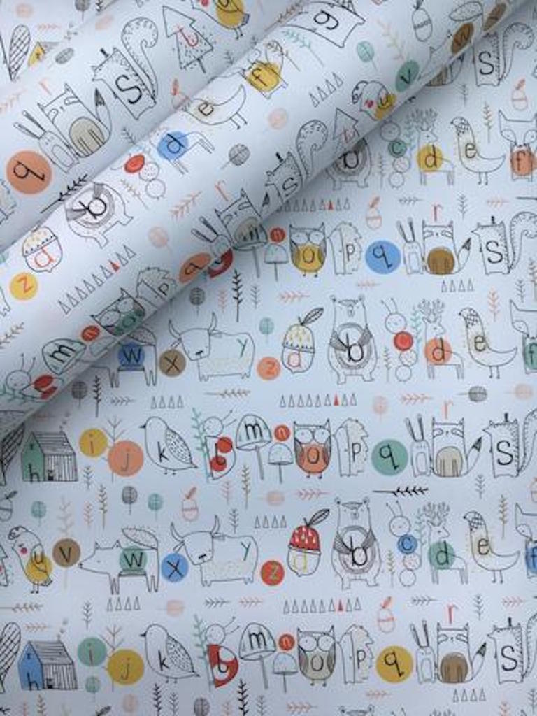 Close up Beautiful Woodland Alphabet Gift Wrapping paper for Christmas, Birthdays, and Christening 