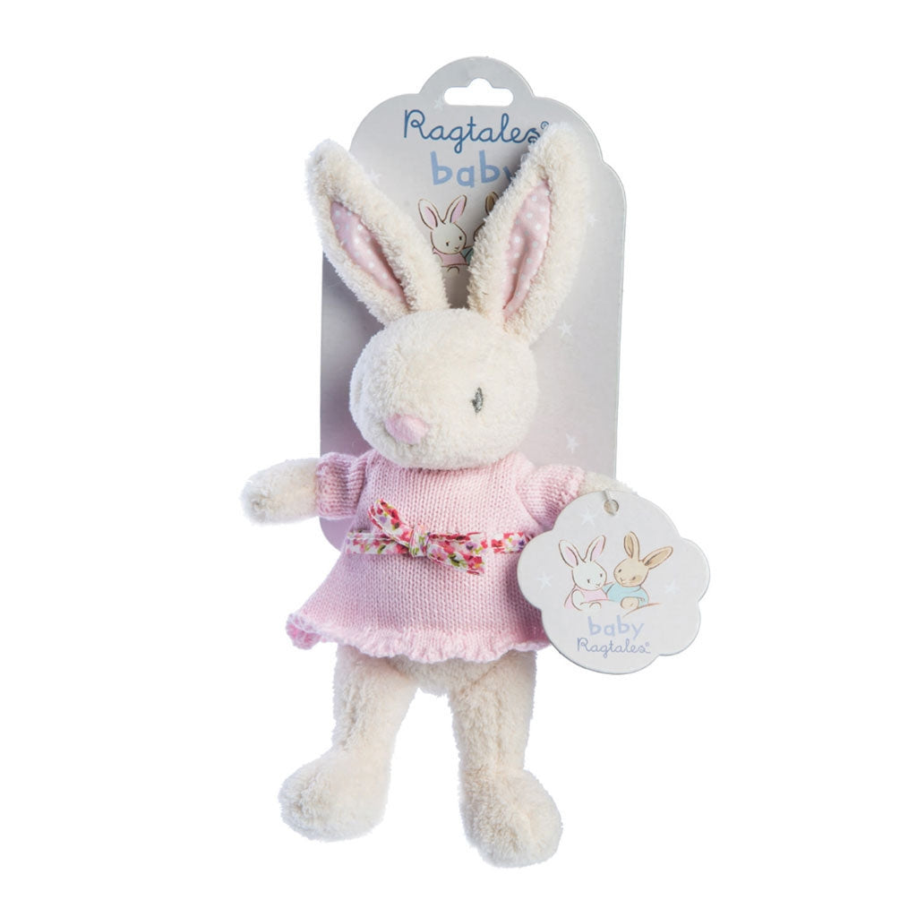 ragtales baby fifi rabbit soft rattle wearing baby pale pink cotton dress with floral bow