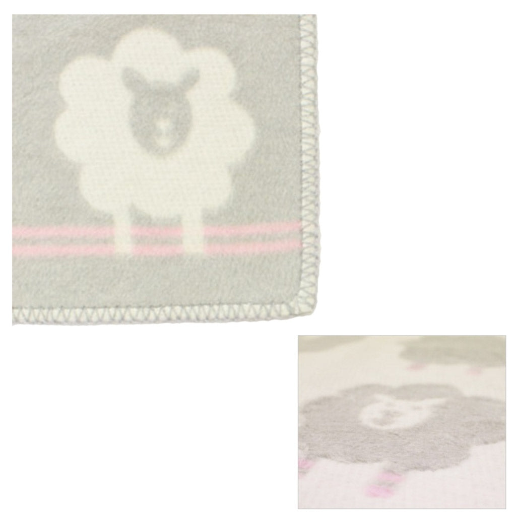 David Fussenegger handmade austrian baby girl nursery blanket with fluffy sheep with blanket stitched edges