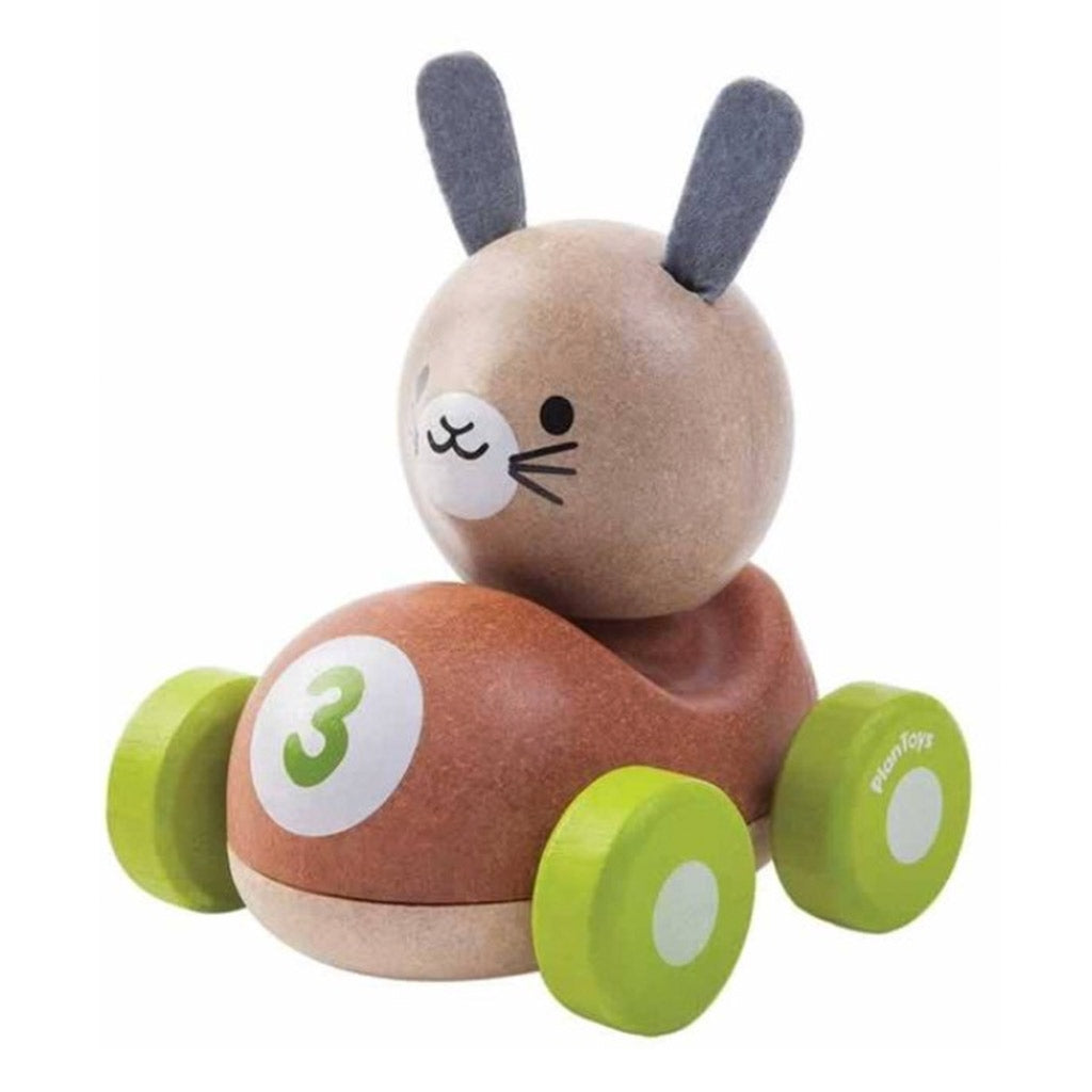 Plan Toy Bunny Racer is a 11cm Wooden Brown Car for Christmas Birthday Gift Being Driven by an Ears Up Rabbit at Hedgehoggifts.com