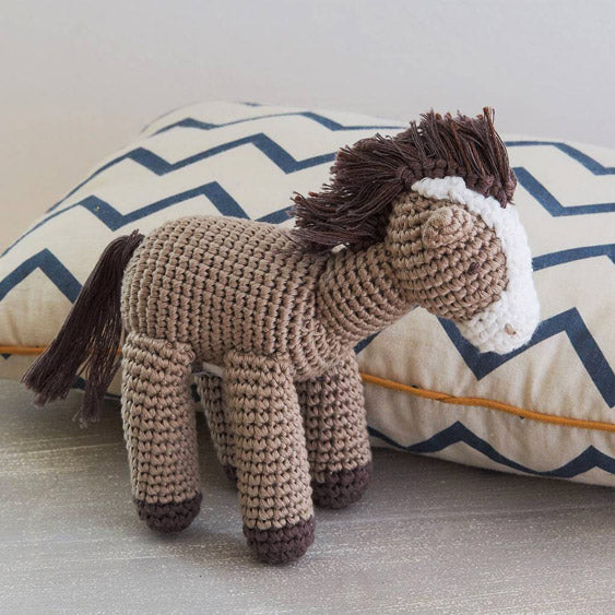 Albetta Crochet Horse Soft Toy  by a cushion