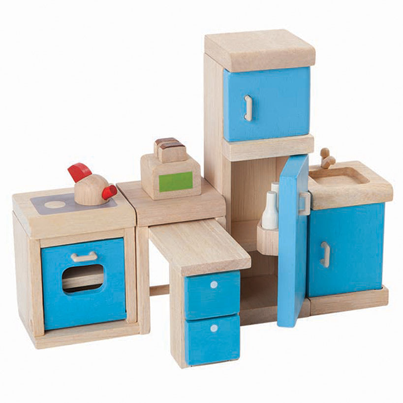 Plan Toys cute dolls house kitchen with fridge freezer kettle toaster hob oven sink and cupboards
