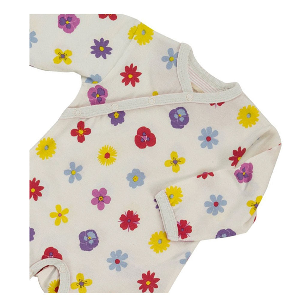 close up of a top quality pretty organic Pansy Flower romper from Pigeon Organics