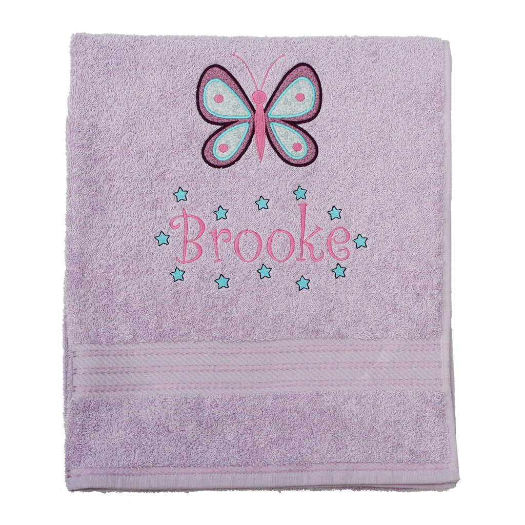 Beautifully embroidered towel with an appliquéd design of a butterfly and personalised with a first name surrounded with either daisies or stars.