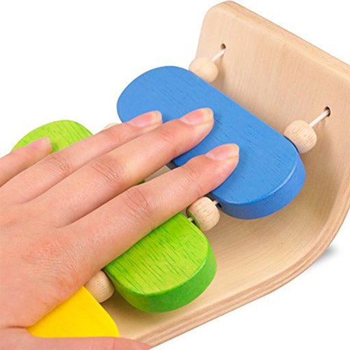 Plan Toys Oval Xylophone made of sustainable wood with a unigue colourful design gift for Christmas Birthdays musical toy