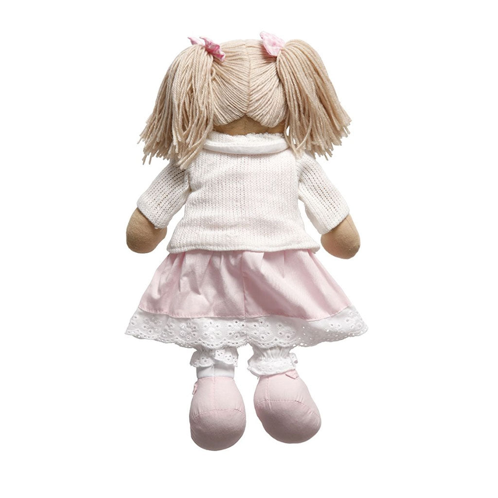 Rear view of Powell Craft Rag Doll dressed in a beautiful detailed embroidered lace trimmed skirt and cosy buttoned cardigan with velco fastenings.