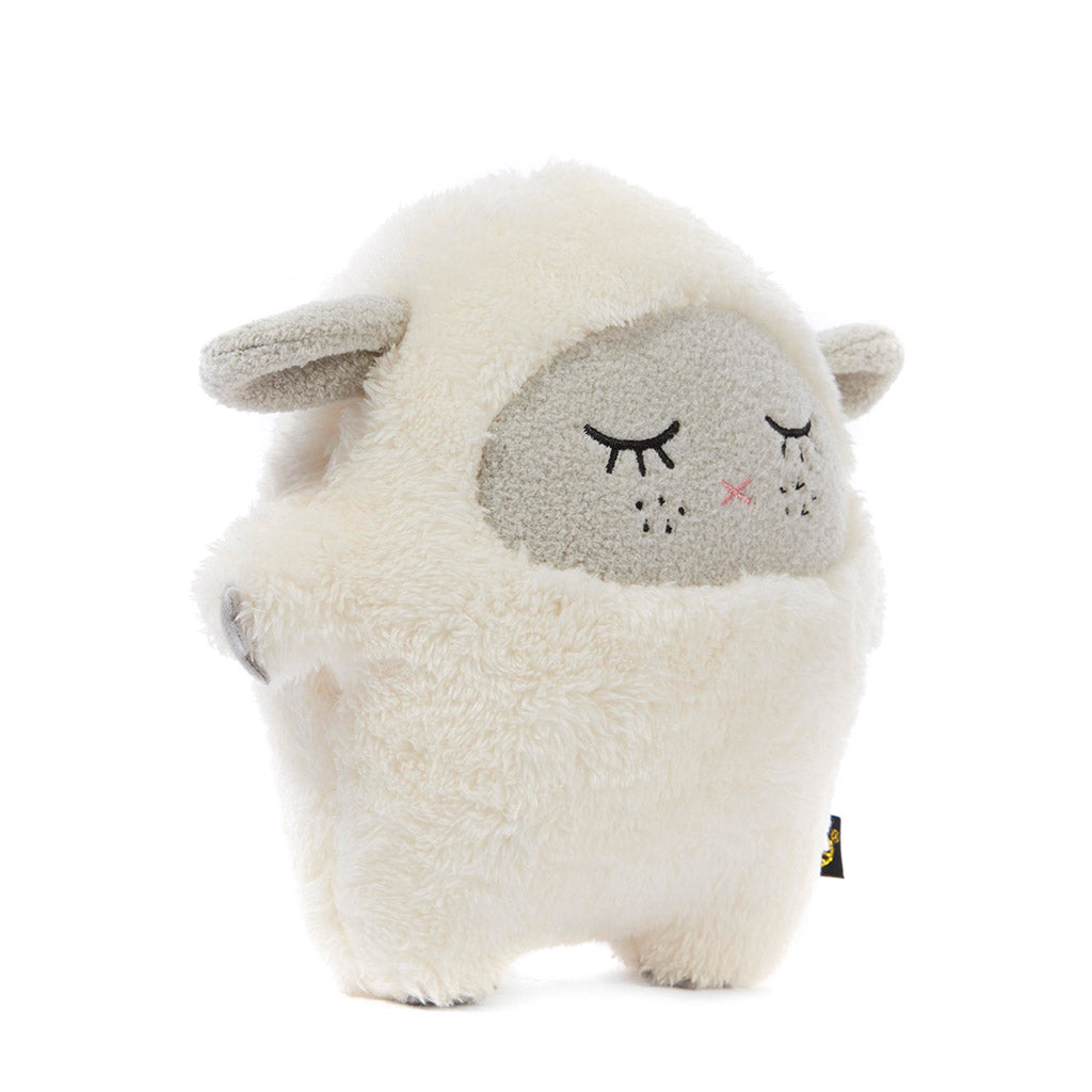 Side view of a Noodoll Ricewool sheep Soft toy