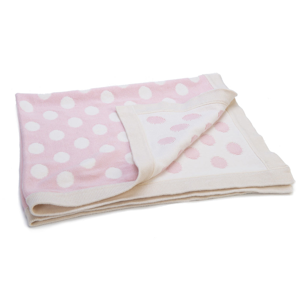 A beautiful organic pink and cream Spotty Blanket luxury double sided organic  blankets have been knitted in beautiful two-tone colours made of the softest cotton