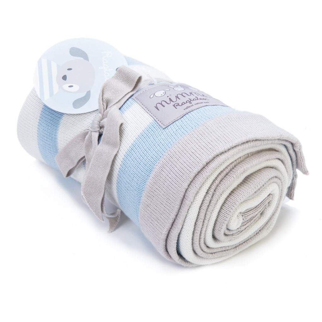 Rolled up A beautiful organic blue & white Stripe Blanket made from the softest cotton yarn and pre washed to ensure a gentle softness